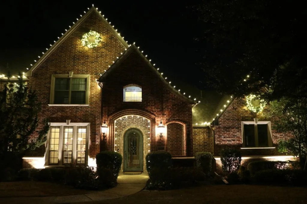 Image of a home with professional Christmas lighting installed by Fairway Lawns